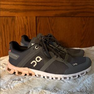 On Running women’s Black and Tan Athletic Shoes